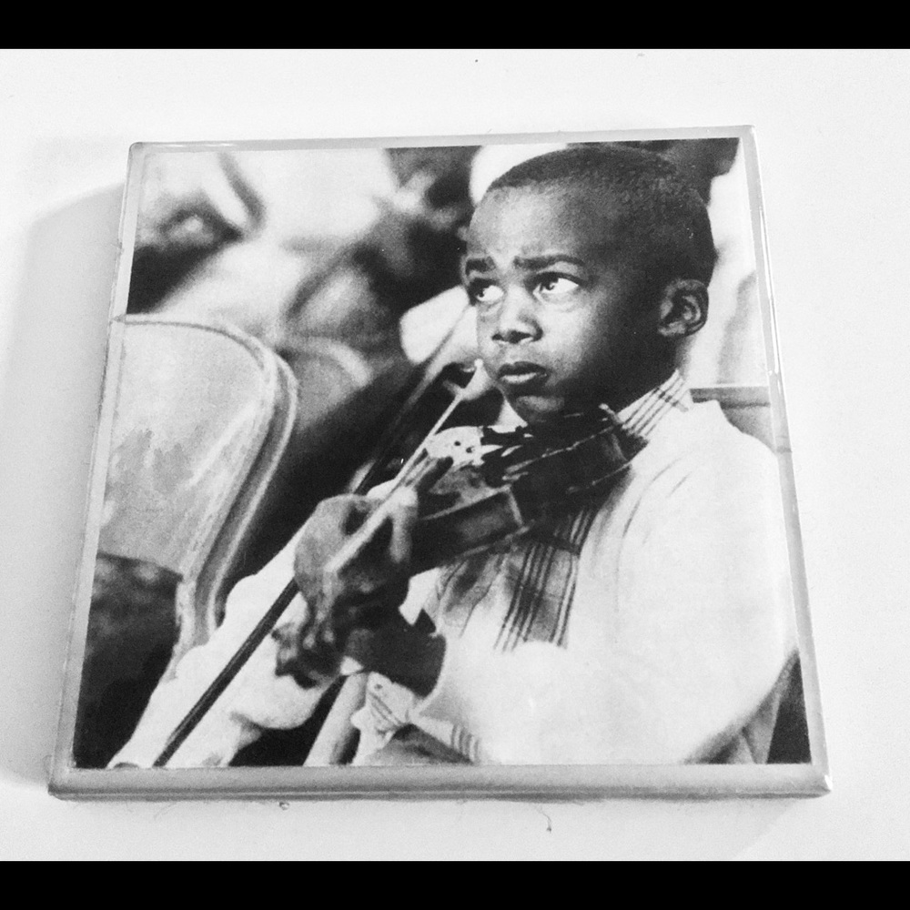 Young boy playing violin